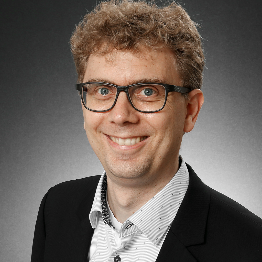 Dr. Christian Hauser