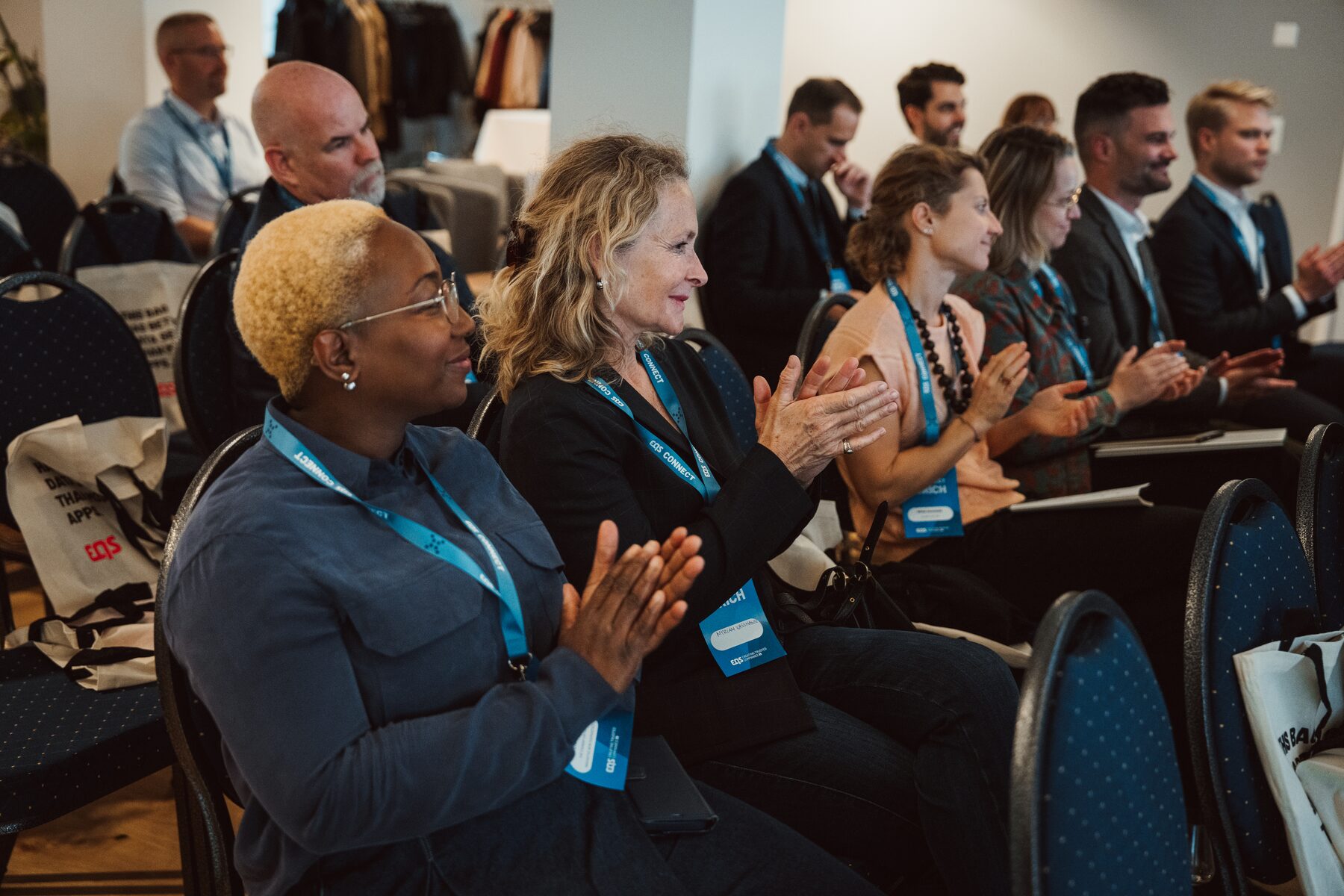 Audience applauding at EQS Connect Zurich 2025