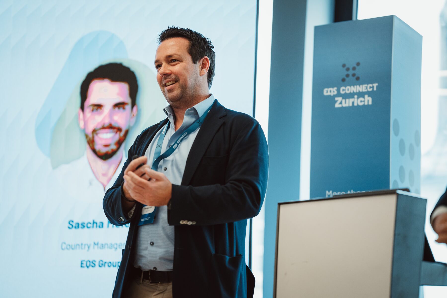 Speaker on stage at EQS Connect Zurich 2025